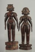 TWO 19TH CENTURY SOUTH INDIAN -POSSIBLY TAMIL NADU CARVED WOOD FIGURES, 32cm and 30cm high.