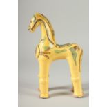 A CANAKKALE TURKISH POTTERY FIGURE OF A HORSE, 25cm high.