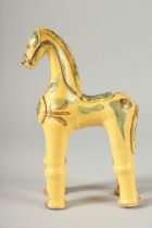 A CANAKKALE TURKISH POTTERY FIGURE OF A HORSE, 25cm high.