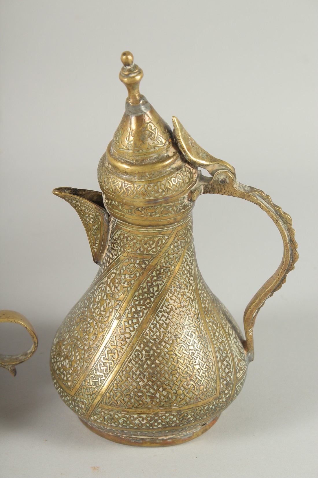 THREE 19TH CENTURY IRANIAN ENGRAVED BRASS PIECES; comprising a twin handle vase / vessel with - Image 8 of 8