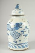 A LARGE CHINESE BLUE AND WHITE PORCELAIN DRAGON JAR AND COVER, 47cm high.
