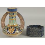 A MOROCCAN TWIN HANDLED VASE AND ANOTHER BLUE GLAZE INKWELL, (2).