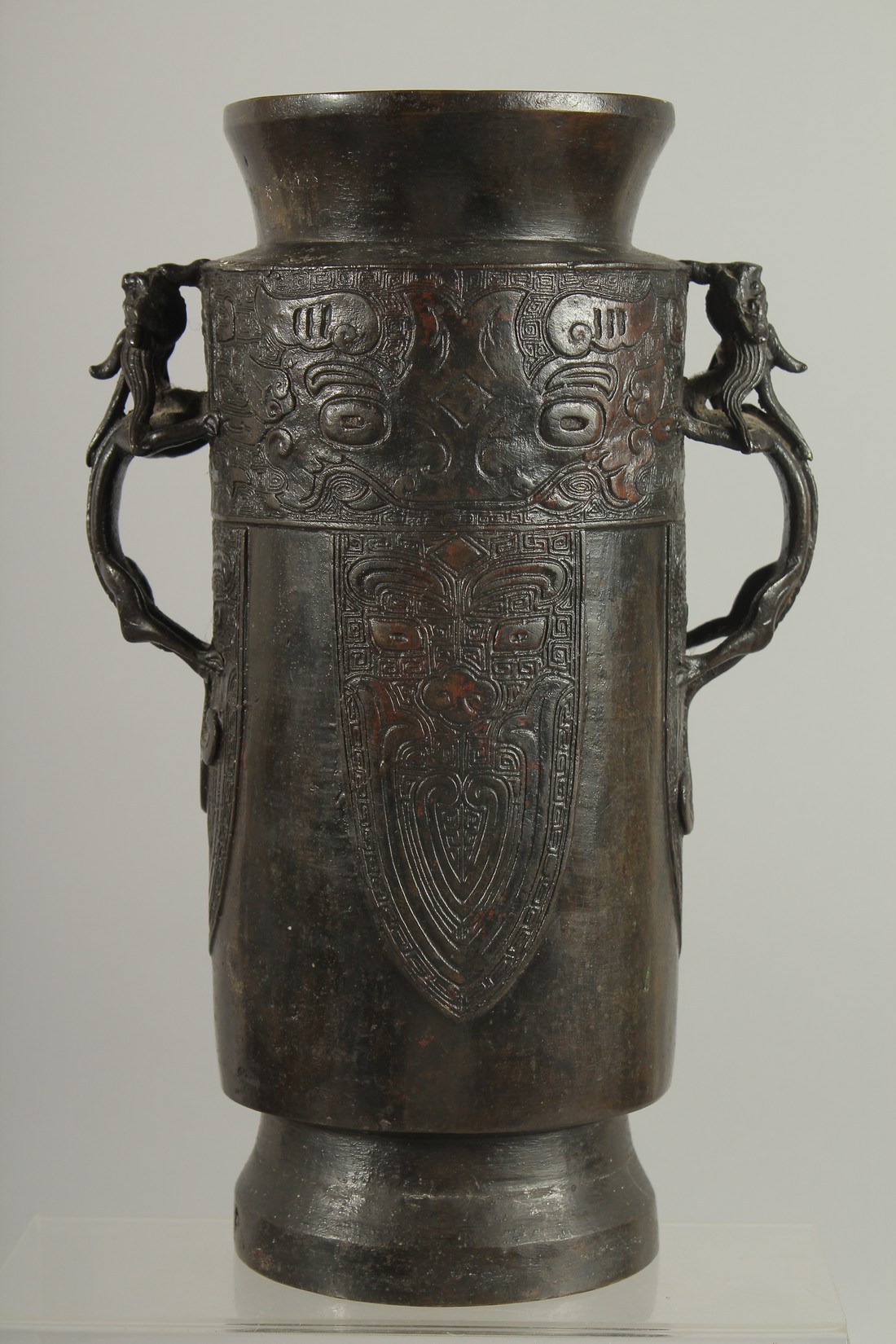 A CHINESE BRONZE VASE WITH TWIN CHILONG HANDLES, with archaic style mask decoration, 28cm high. - Image 3 of 6