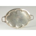 A FINE SIGNED IRAQI NIELLO SILVER TWIN HANDLED TRAY, stamped to the centre, 53cm x 32cm.