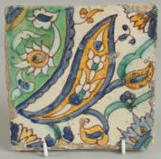 AN 18TH CENTURY NORTH AFRICAN TUNISIAN TILE, 15cm square.