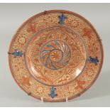 A FINE 19TH CENTURY HISPANO-MORESQUE COPPER LUSTRE AND BLUE GLAZE PLATE, with various motifs and