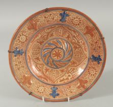 A FINE 19TH CENTURY HISPANO-MORESQUE COPPER LUSTRE AND BLUE GLAZE PLATE, with various motifs and