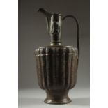 A FINE LATE 12TH CENTURY KHURASAN PERSIAN SILVER AND COPPER INLAID BRASS EWER, the sheet metal