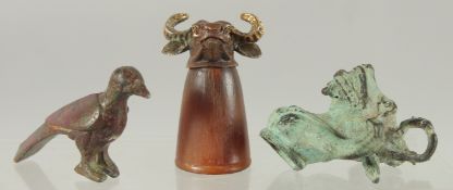 THREE SMALL ANTIQUE BRONZE PIECES, one with rhino horn cup, (3).