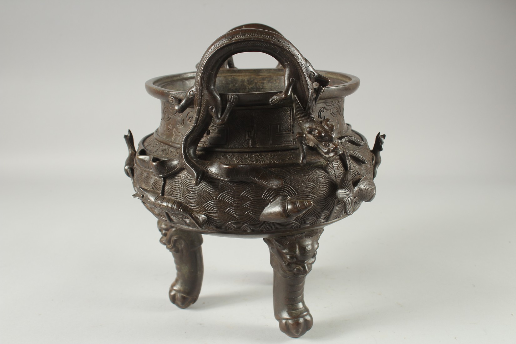 A LARGE CHINESE BRONZE TWIN HANDLE TRIPOD CENSER, with relief horses and sea creatures, the - Image 4 of 7