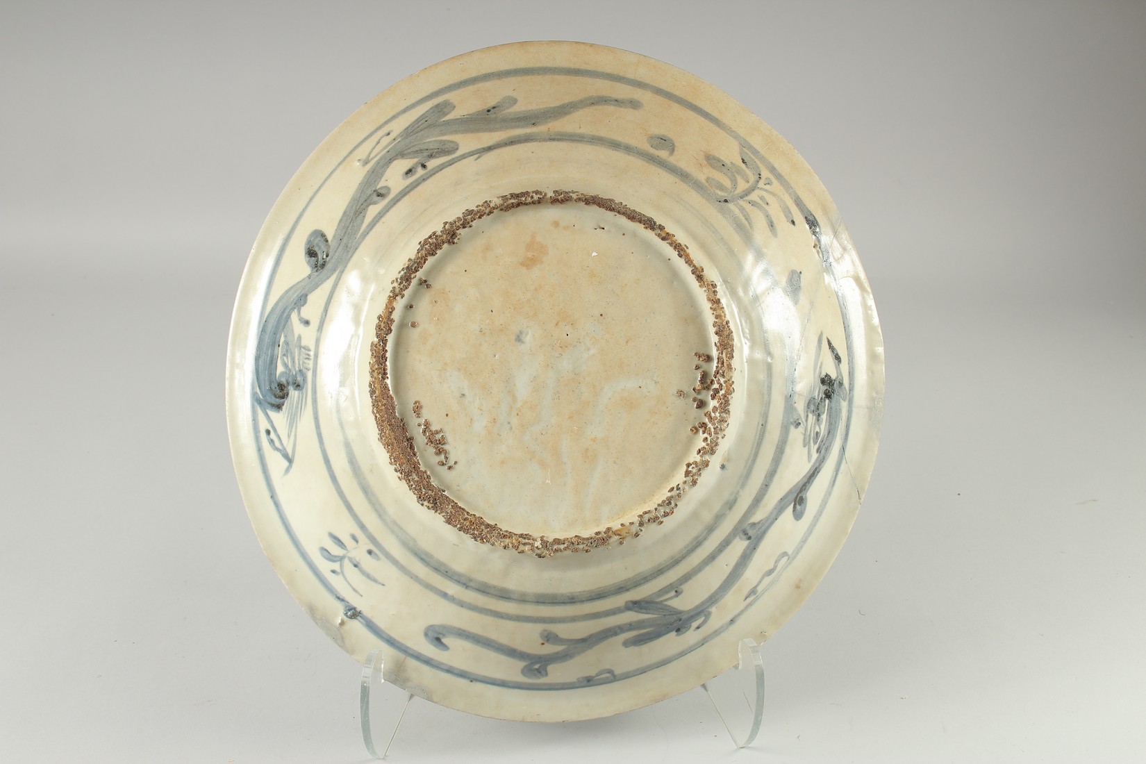 A LARGE CHINESE WANLI BLUE AND WHITE DISH, painted with flora, (repair), 39.5cm diameter. - Image 2 of 2