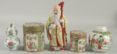 FIVE CHINESE PORCELAIN ITEMS; including two Canton famille rose pots and covers, a figure of an