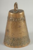 AN 18TH CENTURY ISLAMIC BRASS BELL, with a band of calligraphic inscription, 17.5cm high.