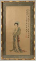 A CHINESE PICTURE ON SILK, depicting a robed female figure, with calligraphy inscription to the