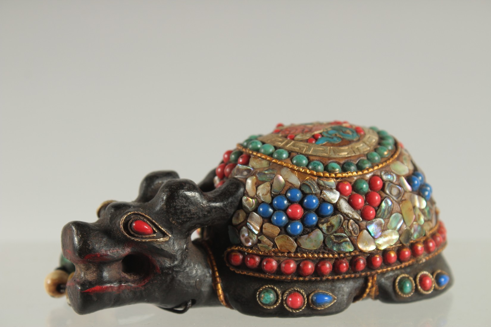 A TIBETAN ABALONE INLAID FIGURE OF A TORTOISE, inset with various other beads, 9cm long. - Image 2 of 4