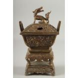 A CHINESE BRASS CENSER, with beast-form finial, 30cm high.