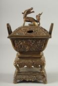A CHINESE BRASS CENSER, with beast-form finial, 30cm high.