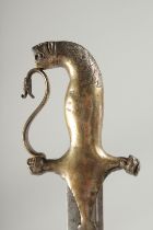 AN INDIAN MYSORE SWORD, the silver gilt hilt with lion's head pommel and quillon terminals,