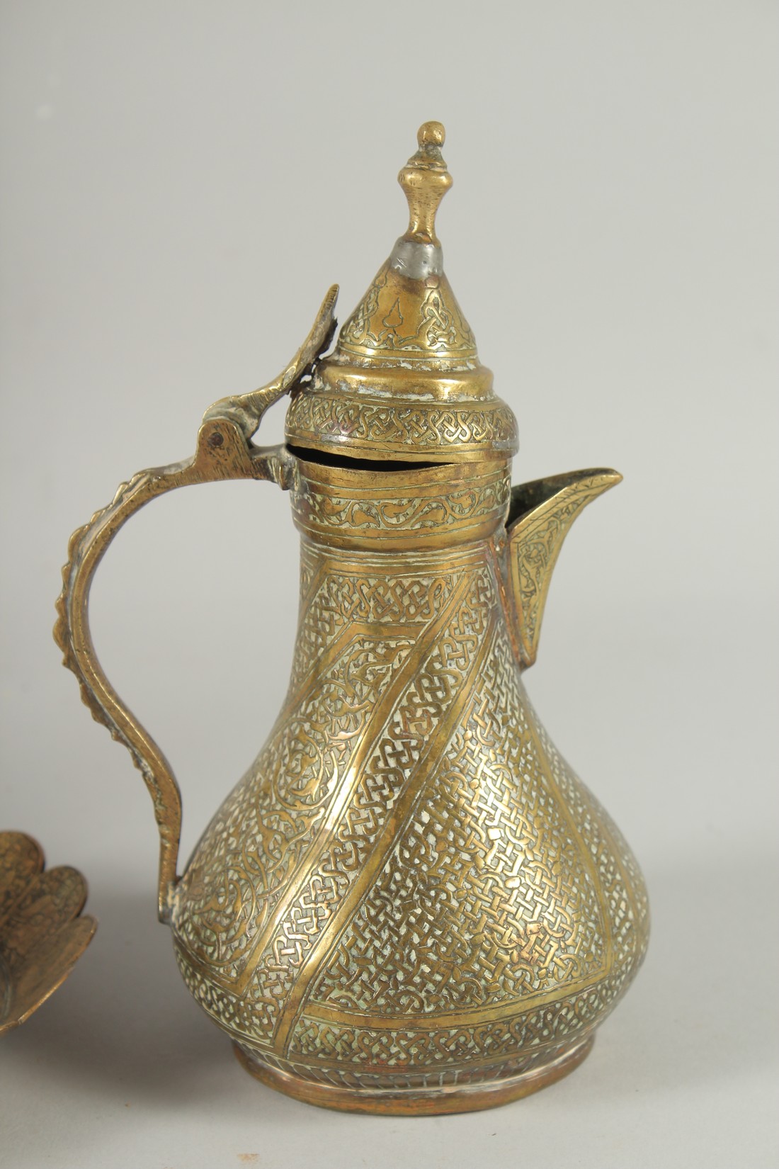 THREE 19TH CENTURY IRANIAN ENGRAVED BRASS PIECES; comprising a twin handle vase / vessel with - Image 4 of 8