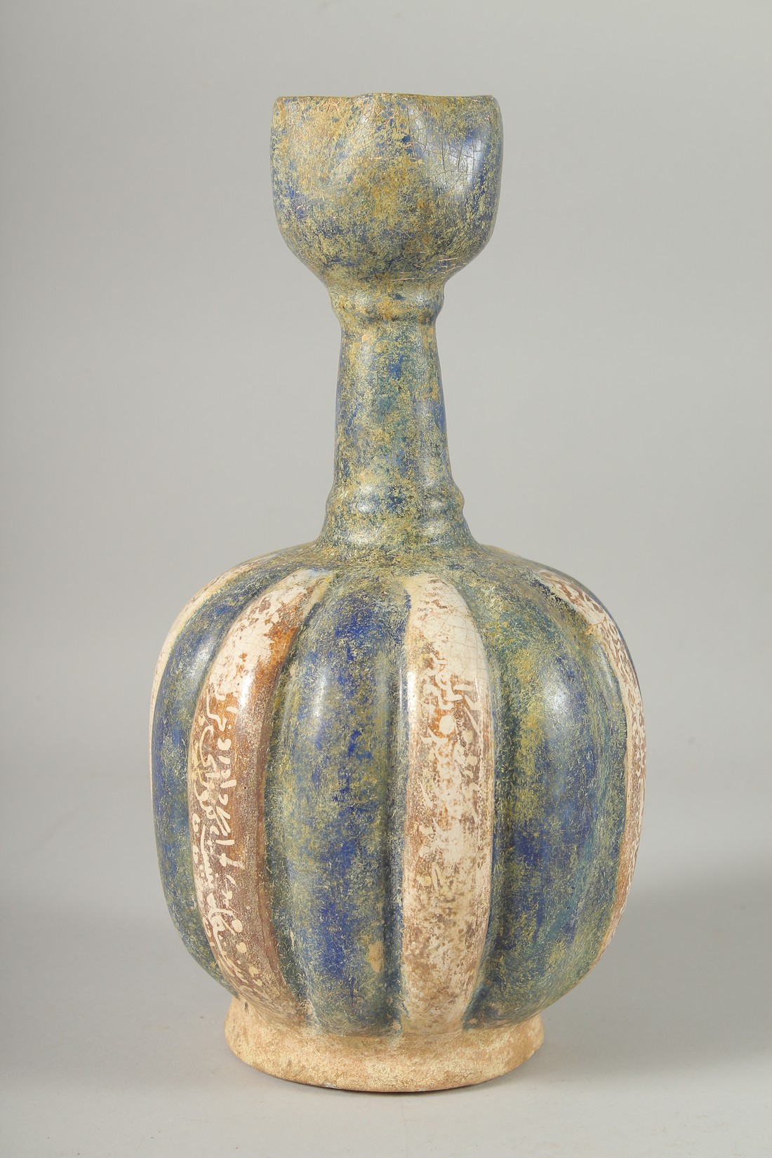 A KASHAN STYLE GLAZED POTTERY VASE, the body of ribbed form with panels of - Image 3 of 6