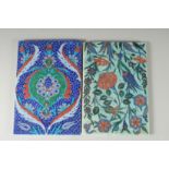 TWO IZNIK REVIVAL GLAZED POTTERY TILES, 24cm x 16.5cm.