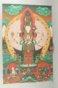 A TIBETAN THANGKA MOUNTED ON PAPER.