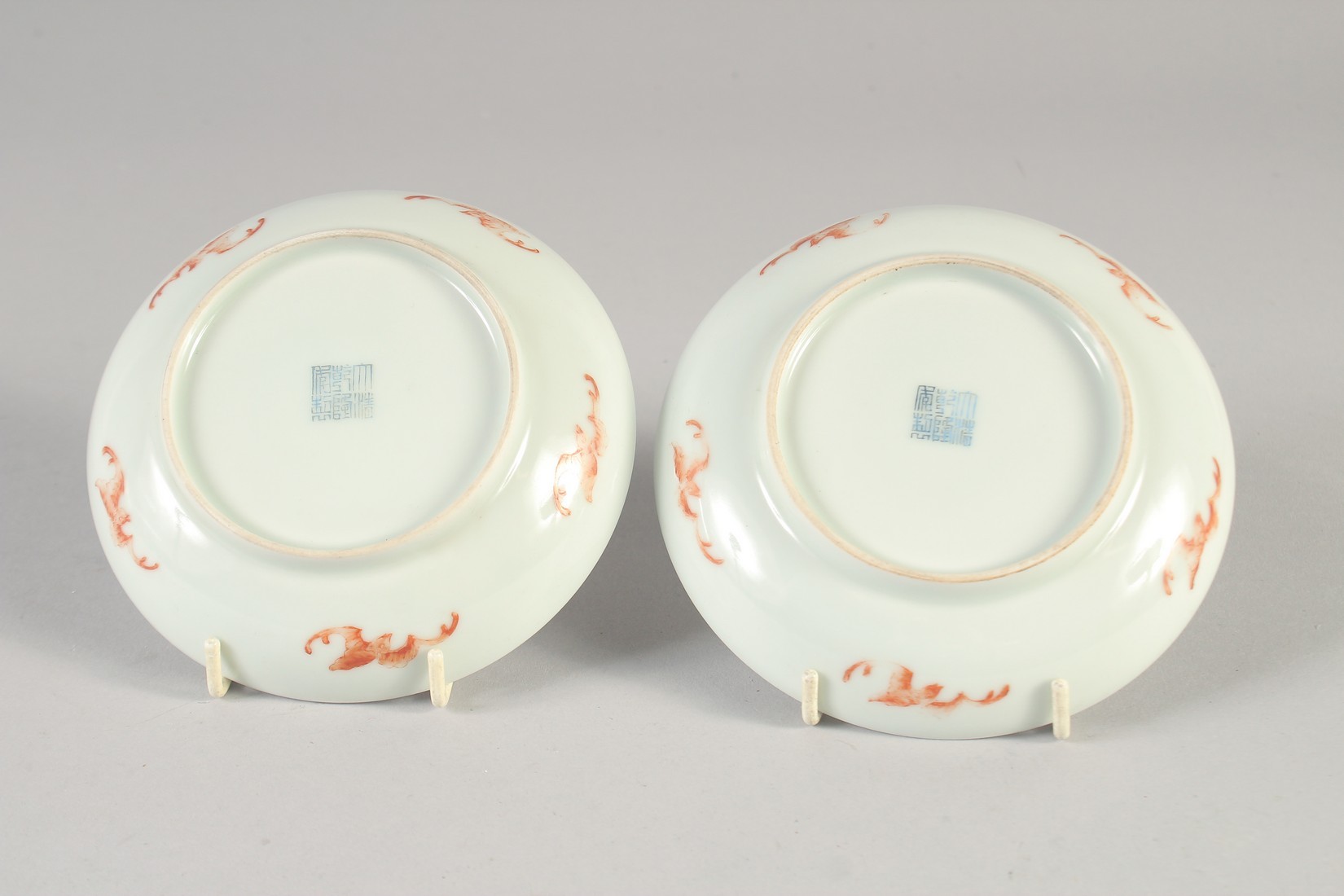 A PAIR OF CHINESE FAMILLE ROSE PORCELAIN BUTTERFLY SAUCERS, six-character mark to base, 13.5cm - Image 2 of 2