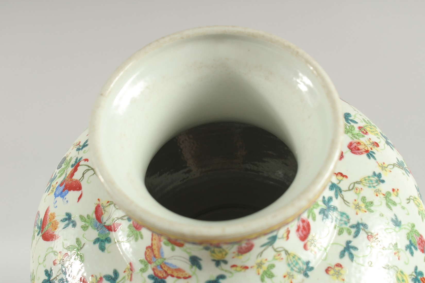 A CHINESE FAMILLE ROSE PORCELAIN SQUAT-FORM VASE and hardwood stand, the vase decorated all over - Image 5 of 6