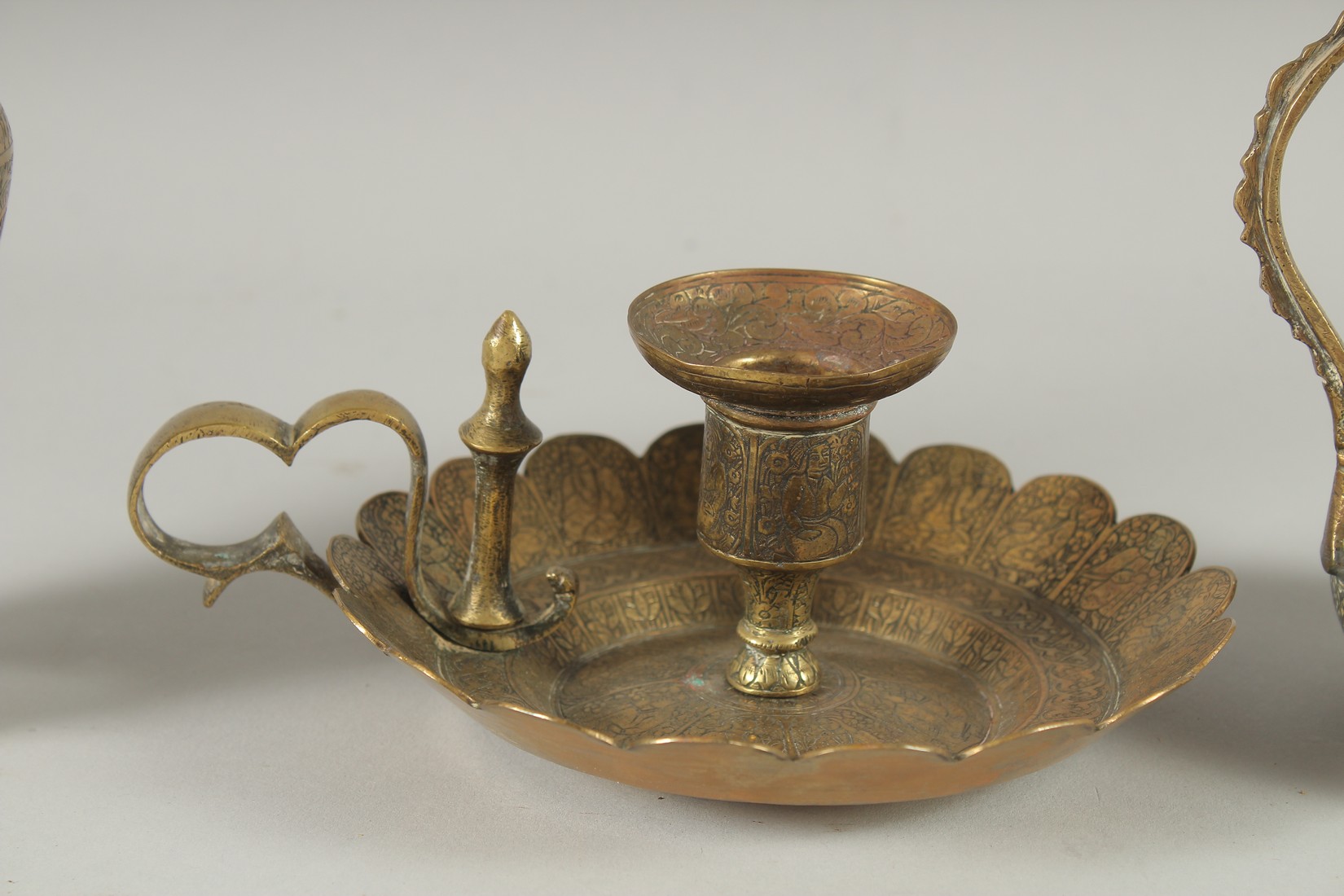 THREE 19TH CENTURY IRANIAN ENGRAVED BRASS PIECES; comprising a twin handle vase / vessel with - Image 3 of 8