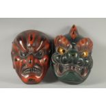 TWO JAPANESE LACQUERED NOH MASKS.
