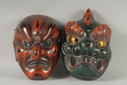 TWO JAPANESE LACQUERED NOH MASKS.