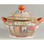 A CHINESE CANTON FAMILLE ROSE PORCELAIN TUREEN AND COVER, painted with panels of scenes with