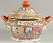 A CHINESE CANTON FAMILLE ROSE PORCELAIN TUREEN AND COVER, painted with panels of scenes with