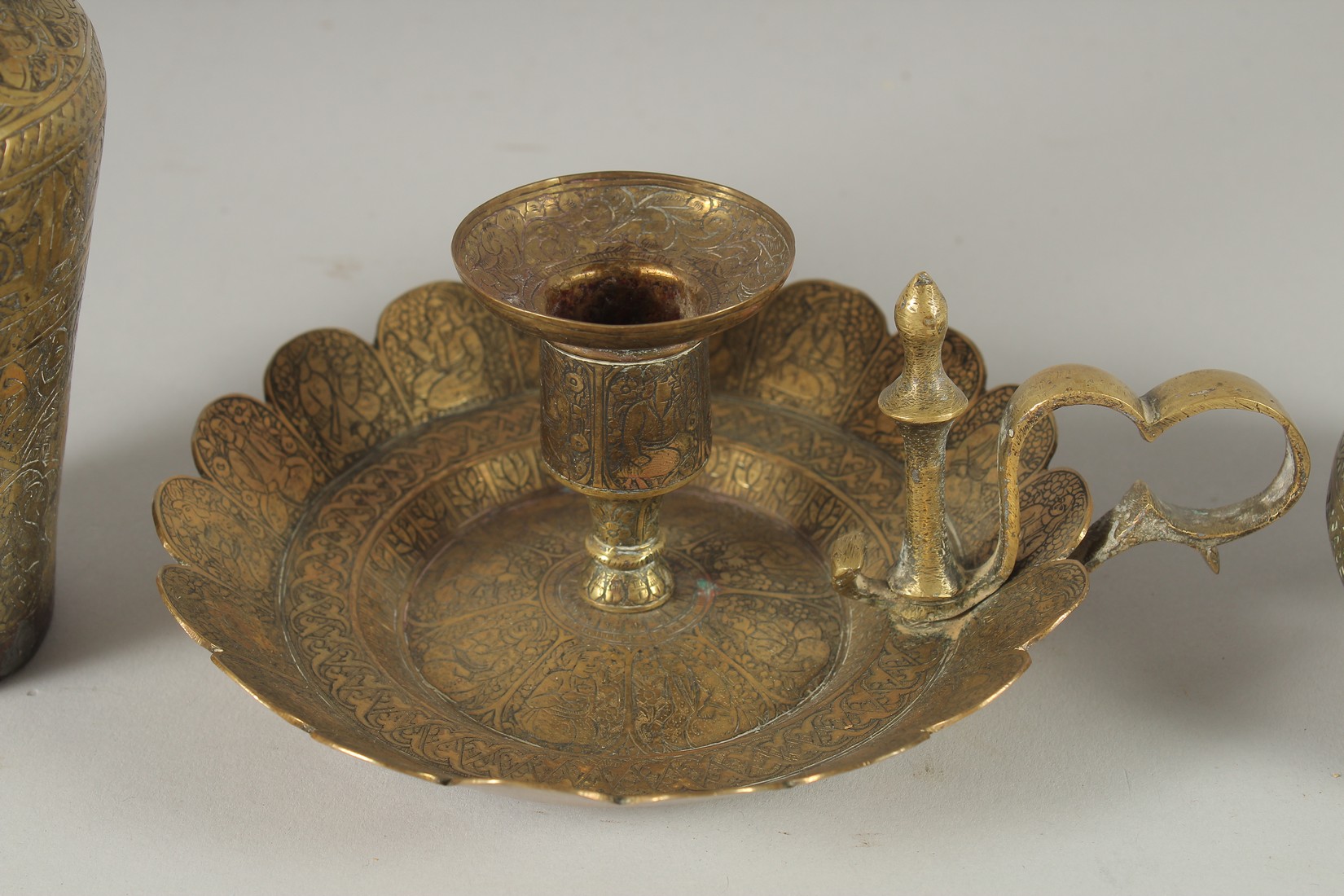 THREE 19TH CENTURY IRANIAN ENGRAVED BRASS PIECES; comprising a twin handle vase / vessel with - Image 6 of 8
