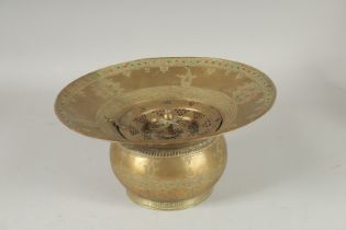 A 19TH CENTURY PERSIAN OR CENTRAL ASIAN BUKHARA BRASS BASIN, 30cm diameter.