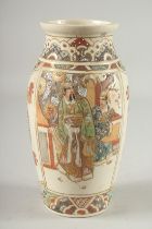 A JAPANESE SATSUMA VASE, decorated with panels of figures, 24cm high.
