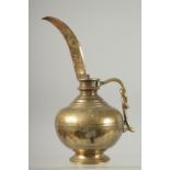 A FINE 18TH-19TH CENTURY SOUTH INDIAN OR SRI LANKAN BRASS OIL POURING EWER, 25cm high.