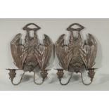 A GOOD PAIR OF BRONZE BAT WALL SCONCES each with two scrolling branches. 10ins long.