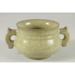 A Chinese celadon crackle glaze twin handled pottery censer. 5.5ins diameter.