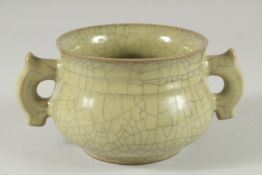 A Chinese celadon crackle glaze twin handled pottery censer. 5.5ins diameter.