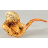 A VERY GOOD LARGE MEERSCHAUM PIPE CARVED AS A CAVALIER, his hands on a sword, the man has a long