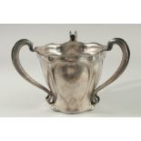 A GOOD LARGE ART NOUVEAU SILVER TYG engraved with a crest.