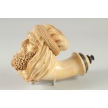 A SUPERB CARVED MEERSCHAUM PIPE CARVED AS AN ARAB MAN'S HEAD. with a long beard and head cover. 15cm