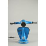 A BLUE VESPA LAMP