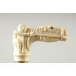 A WALKING STICK with carved bone handle. "HORSE & JOCKEY"