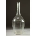 A LARGE BULBOUS DECANTER.