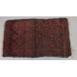 A BELOUCH PERSIAN RUG. 43ins x 24ins.