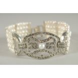 A SILVER, PEARL AND MARCASITE FIVE ROW BRACELET.