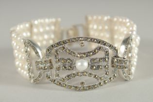 A SILVER, PEARL AND MARCASITE FIVE ROW BRACELET.