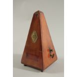 A FRENCH METRONOME, 'PAQUET'. 8.5ins high.